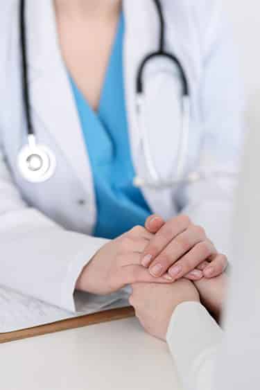 Oncologists Targeting - Comforting Patient